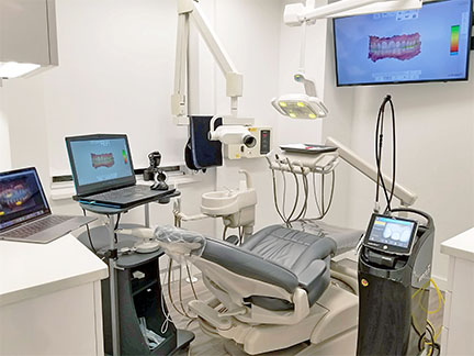 implant dentist NYC exam room